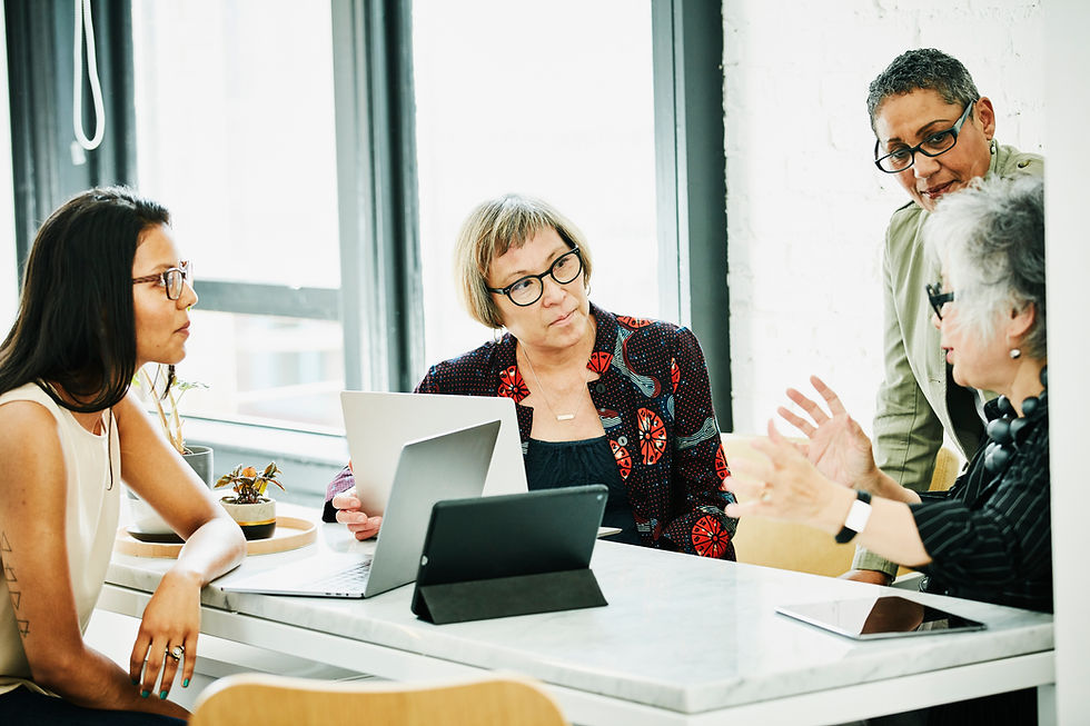 A group of women at a business meeting